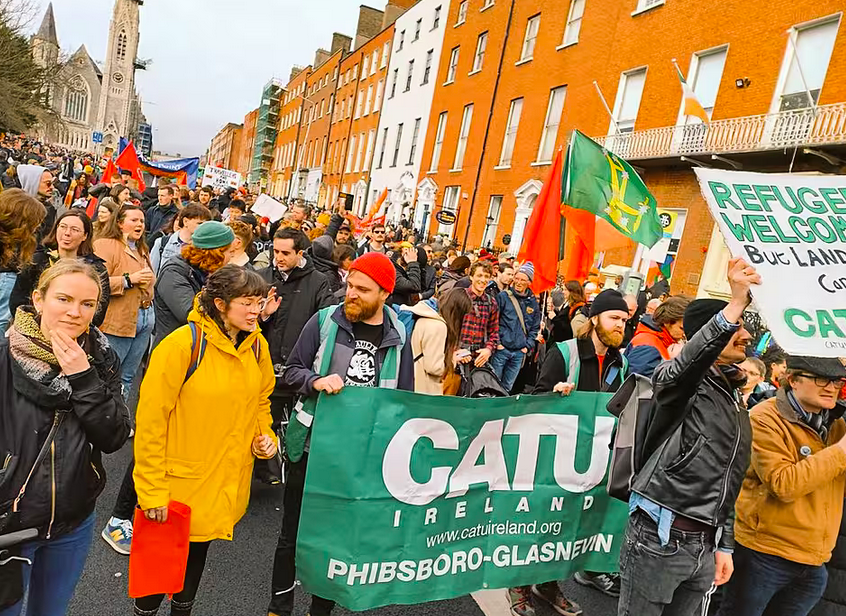 Large housing protest with CATU Phibsboro-Glasnevin Banner in focus