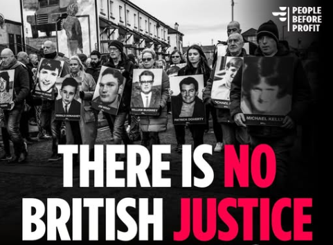 Bloody Sunday families holding pictures of their murdered relativesmarching behind the words THERE IS NO BRITISH JUSTICE. Party logo upper right.