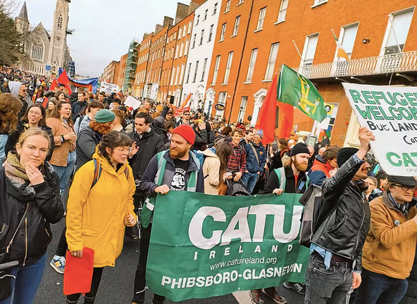 Large housing protest with CATU Phibsboro-Glasnevin Banner in focus